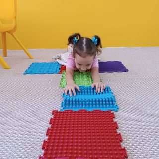 FasTracKids Zaman, logo