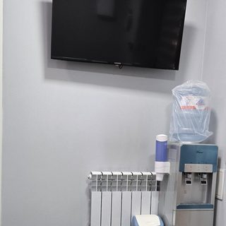 Dr. Rassel dental clinic, logo