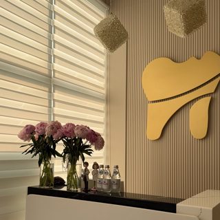 Rabiya Dental Clinic, logo