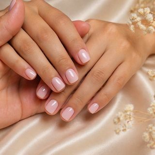 Tata Nails School, logo