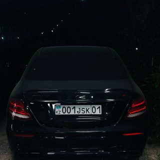 Тассай, логотип